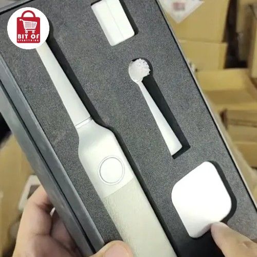 ELECTRIC TOOTH BRUSH